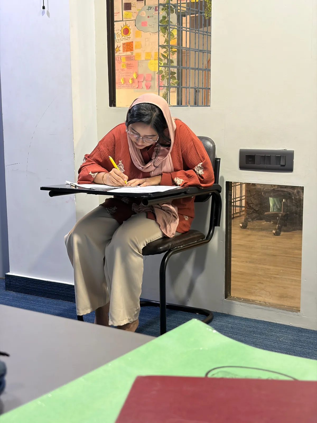 A PlaceX student writing the certification exam