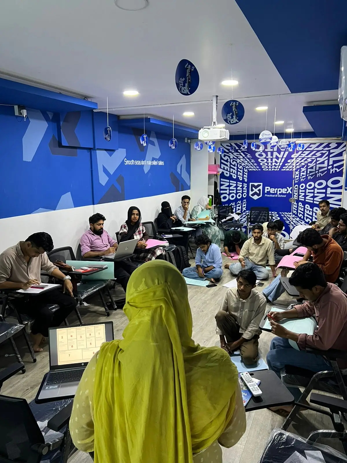 A trainer leading a live class at PerpeX B-School, the practical business school in Kozhikode